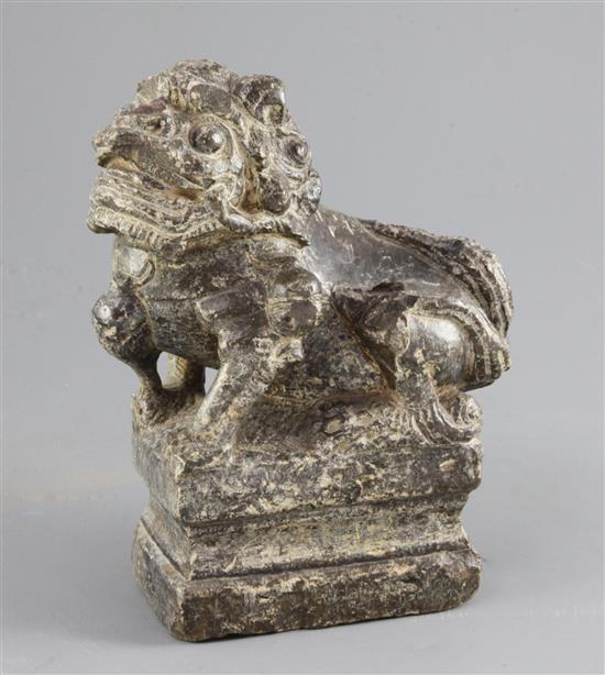 A Chinese grey stone carving of a lion-dog, Ming dynasty or later, height 20cm